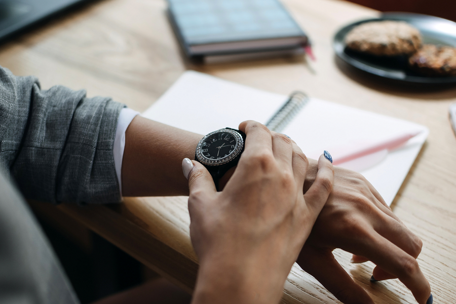 Close up of someone's wrist with a watch on.