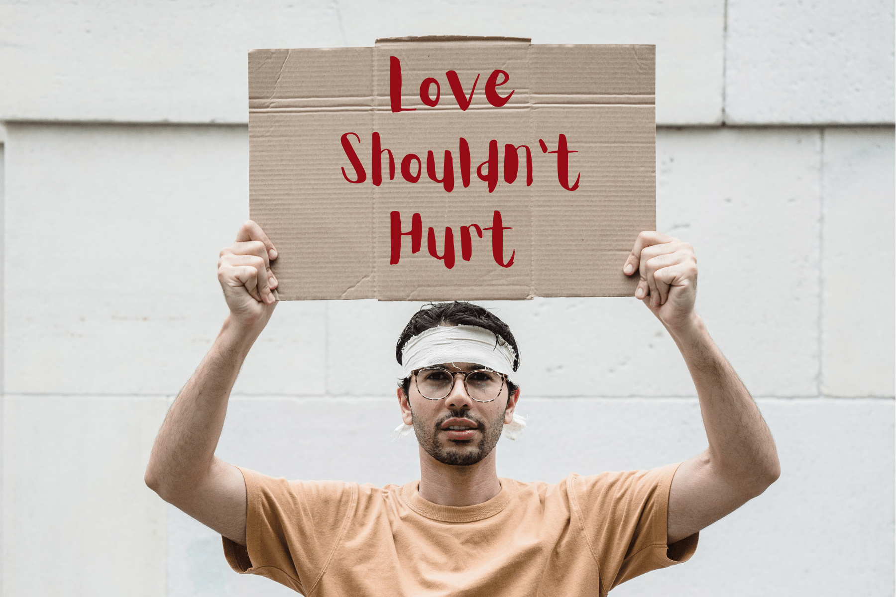 photo of a cardboard sign with the words 