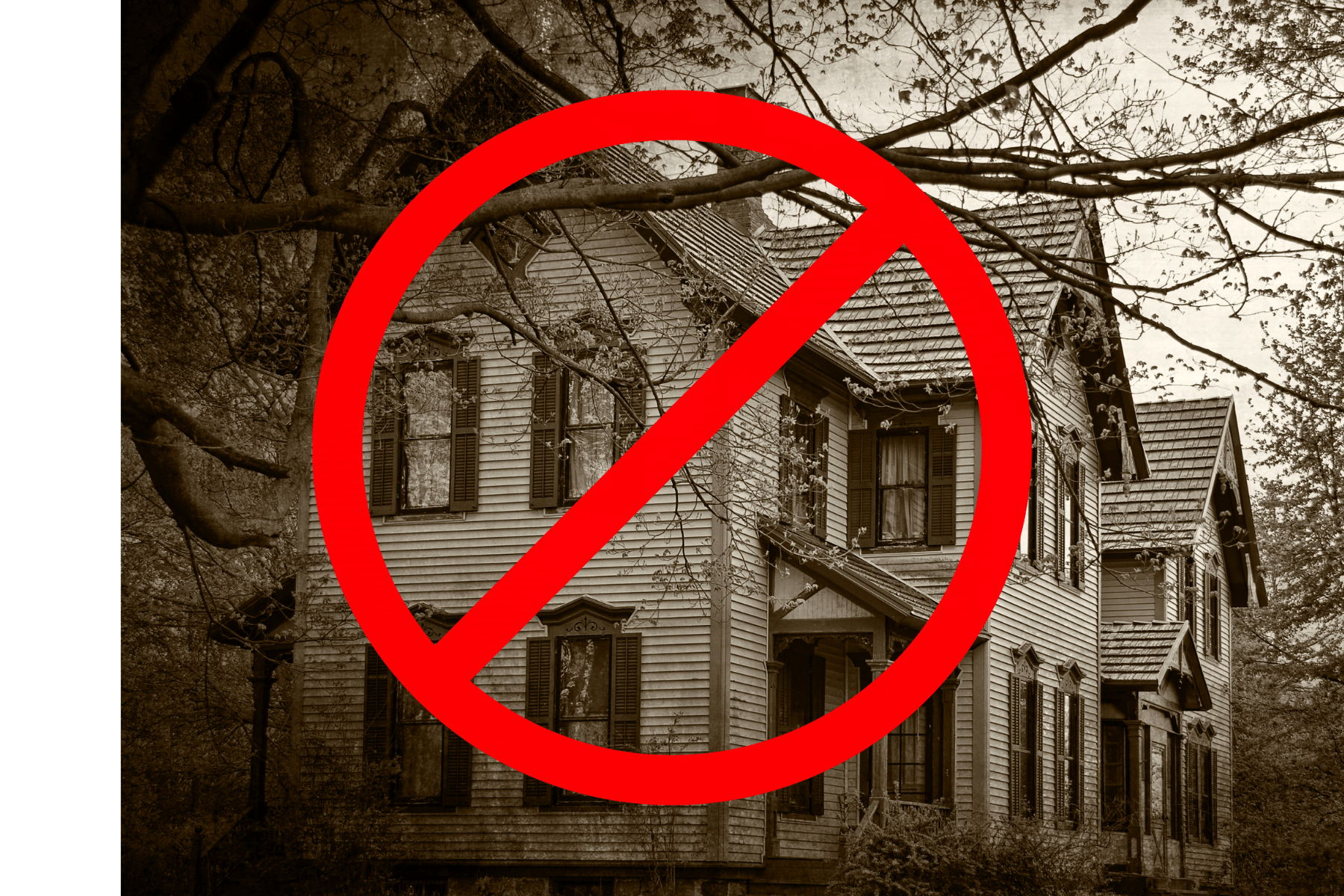 black and white photo of an old house with a circle and line through it.